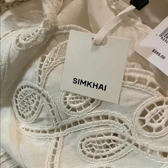 SIMKHAI Ivory Morrigan Short Sleeve Mini Dress. Models is wearing size 2. - Picture 7 of 8